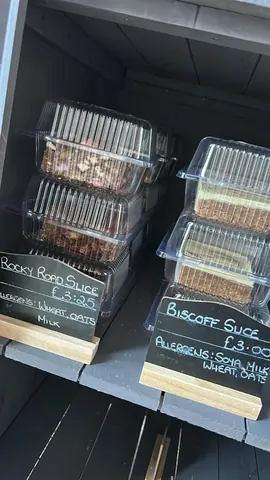 A display of food items in plastic containers.