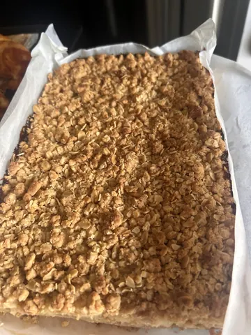 A cake with a lot of crumbs on it.