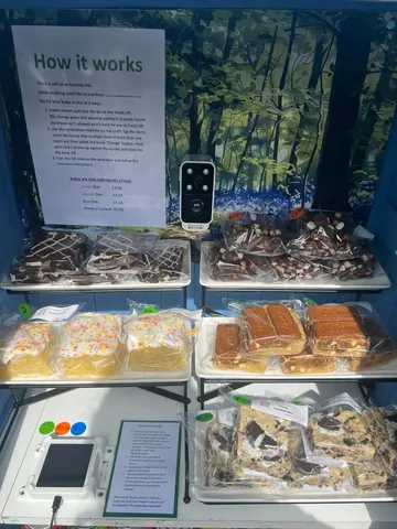 A display of various desserts is on a table.