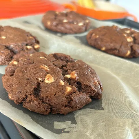 A tray of cookies is on a table.