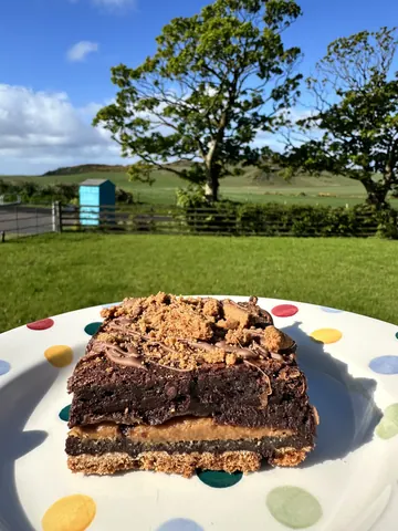 A plate with a slice of cake on it.